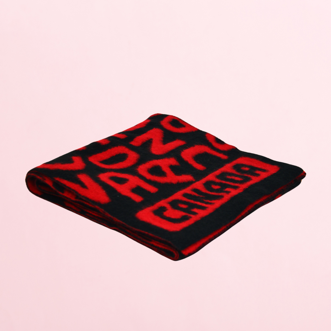 A scarf with the word Canada.
