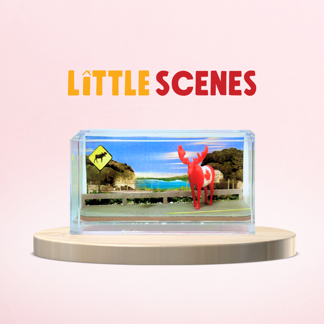 A miniature scene with a red and white moose.